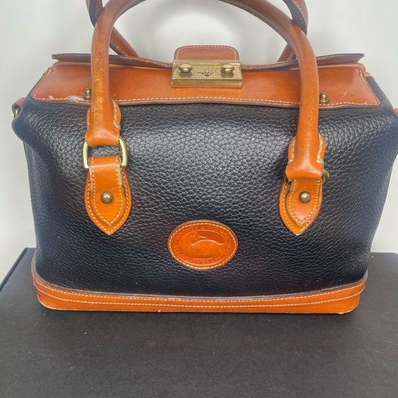 Dooney & Bourke Handbags - Dooney & Bourne Vintage Black and Brown Leather Handbag
